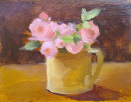 Roses in tan pitcher