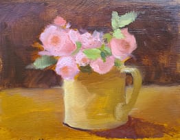 Roses in tan pitcher
